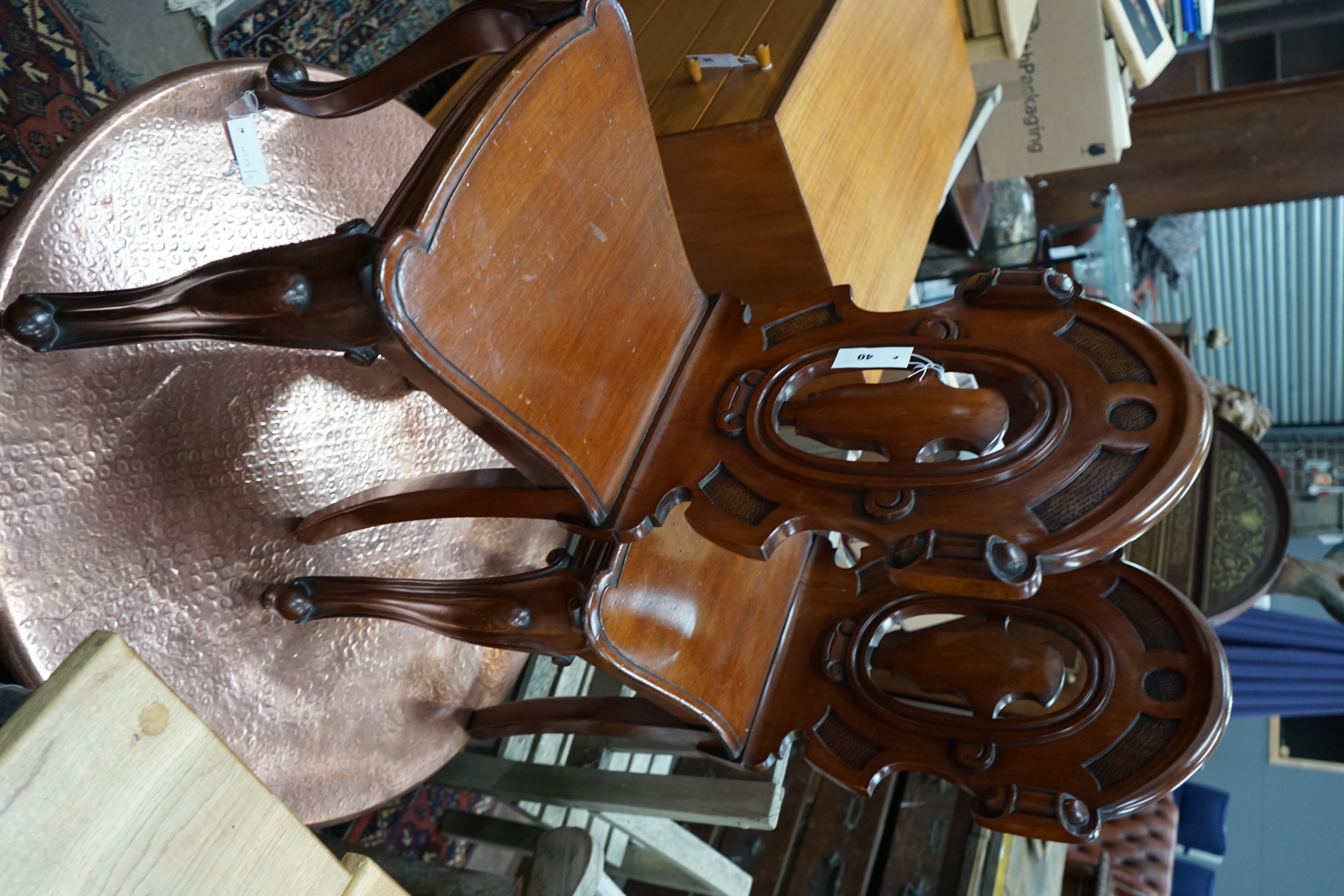 A pair of Victorian mahogay hall chairs